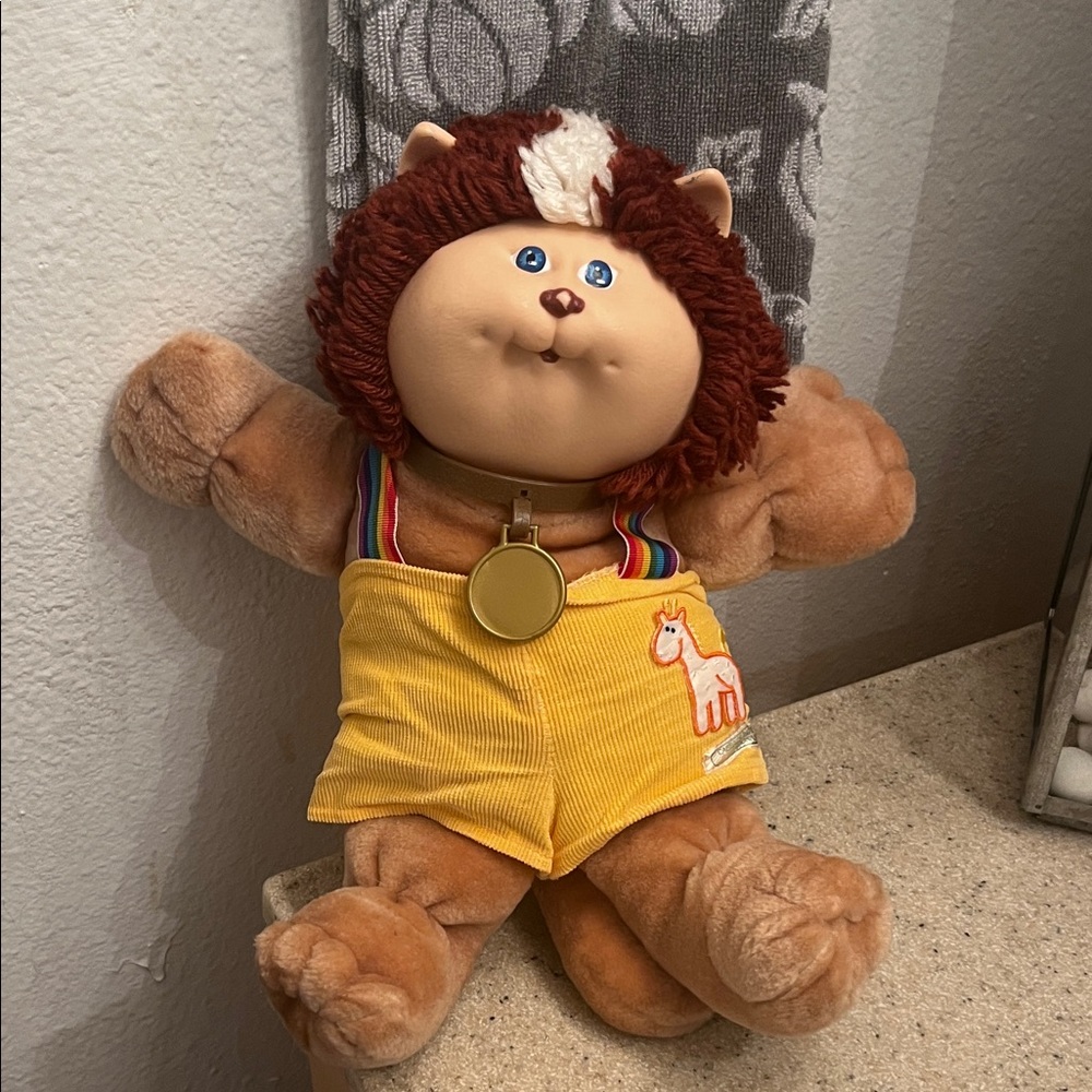 Cuddly Brown Plush Lion with Yellow Outfit